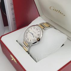 Men's Cartier 42mm Ballon Bleu Two Tone 18K Yellow Gold / Stainless Steel Watch with Roman Numeral Silver Dial and Smooth Bezel. Includes Box and Papers. Ballon Bleu de Cartier watch, 42 mm. Mechanical movement with automatic winding, caliber 1847 MC. Steel case, 18K yellow gold (750/1000) fluted crown set with a cabochon synthetic spinel. Silver guilloché dial. Blued-steel sword-shaped hands. Sapphire crystal. Calendar aperture at 3 o’clock. Two-tone interchangeable bracelet. Thickness: 13 mm. Interchangeable Bracelet, Cartier Watch, Blue Steel, Roman Numeral, Mechanical Movement, 3 O Clock, Steel Watch, Stainless Steel Watch, Roman Numerals