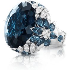 Crafted with the utmost care and attention to detail, this 18k white gold ring from Pasquale Bruni's Ghirlanda Couture collection is the epitome of elegance and sophistication. Its exquisite design is further enhanced by the striking London Blue Topaz that takes center stage, exuding a sense of tranquility and calmness. The deep, rich hue of the gemstone is perfectly complemented by the brilliant diamonds that adorn the band, creating a sense of harmony and balance.As you slip this ring onto you Pasquale Bruni, Diamond Birthstone, Jewelry Appraisal, London Blue Topaz, London Blue, Diamond Wedding Rings, White Gold Rings, Cocktail Rings, Jewelry Branding