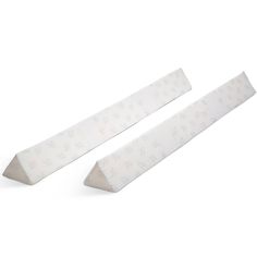 two pieces of white paper sitting on top of each other