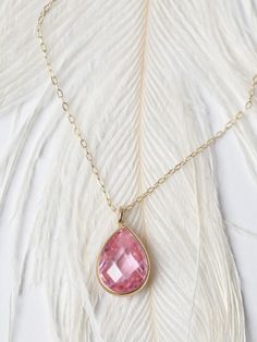 "Get Extra 5% off when you put your item in their cart! CODE: \"MOTHERDAYDEALS\" Pink Sapphire Teardrop Necklace/ Pear Shaped Pink Zircon Pendant/ Faceted Pink Sapphire Necklace/ Everyday Necklace/ Birthday Gift This beautiful, classic solitaire 10 x6mm pear shaped stone is the epitome of understated elegance. The wearer of this exquisite piece is sure to be the envy of everyone in the room with this sparkling pendant that can be worn everyday. Features * Made to Order *Gold KT: 14K Solid Gold * 14k Gold Teardrop Jewelry With Gemstone Accents, Elegant Gemstone Drop Necklace For Anniversary, Pink Pear-shaped Gemstone Necklace, Elegant Teardrop Birthstone Drop Necklace, Elegant Drop Birthstone Necklaces, Elegant Drop Shape Birthstone Necklace, Elegant Birthstone Drop Necklace, Elegant Drop Birthstone Necklace, Elegant Pear-shaped Drop Necklace Gift