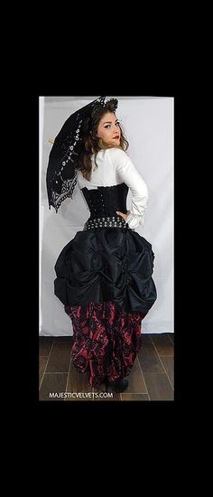 What you get: One Corset One long damask black and WINE skirt. One short black skirt. Description: Corset: 20 grommets in back. Back lacing. 14 bones. Classic Victorian damask pattern SKIRT is gathered in back to give a fabulous full look. Taffeta fabric. Can be worn down in front** or you can tie it up to show your legs. (We sell the chains to give this look). Waistband is elastic. Delicate Steampunk! You need our chains (sold separately) to hitch the skirt up in front. It can be worn down or u Black Gothic Corset For Halloween, Steampunk Black Costume For Cosplay Events, Punk Fitted Corset For Fantasy Events, Gothic Fitted Underbust Costume, Black Punk Corset For Costume, Fitted Black Costume For Larp, Black Fitted Costume For Larp, Punk Black Corset For Cosplay, Punk Style Black Costume Corset