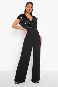 Womens Sequin Wrap Wide Leg Jumpsuit - Black - 12 - Sitting pretty at the top of our wishlist this season is this wide leg jumpsuit from our latest collection. Naturally working to balance out your silhouette by creating the illusion of an hourglass figure, this one-piece garment elongates the legs and slims the waistline...winner. Make a statement in a wide leg denim jumpsuit paired with western boots and soft waved hair, or choose a classic black wide leg jumpsuit and prepare to turn heads.Sty Formal Jumpsuits For Women Wedding, Gala Outfits For Women, Sequin Jumpsuit Outfit, Waved Hair, Black Wide Leg Jumpsuit, Glitter Jumpsuit, Jumpsuit Pink, Gala Outfit, Glitter Ball