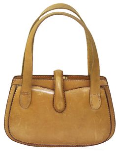 This is an early Gucci leather tan handbag from the 1940's or earlier, with a fabric label in the interior that says: Gucci Firenze V.Vigna Nuova Roma V. Condotti The estate sale representative relayed that the handles appeared to have been replaced at some point in time. Measures 7" height x 10 1/2" length x 2" depth. The strap drop is 6". The purse is in very good vintage condition with some scuffs and marks (see photos). The clasp works. Free domestic shipping with careful packaging, shipping Classic Gucci Rectangular Bag, Retro Gucci Shoulder Bag, Retro Gucci Rectangular Shoulder Bag, Classic Gucci Bag With Detachable Handle, Retro Gucci Evening Bags, Vintage Gucci Shoulder Bag With Gold-tone Hardware, Vintage Gucci Evening Bags, Retro Formal Bags With Brass Hardware, Classic Gucci Tote Shoulder Bag