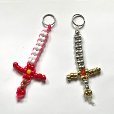 Handmade with pony beads. About 5 X 2.5 inches. Colors and size may vary slightly. Each sword comes with a metal ring or clip. Keychains are perfect for backpacks, purses, tote bags, pin boards, wall decor, and more. Minecraft Pony Bead Patterns, Keychain Ideas Diy Crafts, Things To Make Out Of Pony Beads, Pony Bead Bag Pattern, Diy Pony Bead Crafts, Pony Beads Animals, Seed Bead Animals Patterns Easy, Pony Bead Projects Key Chains, Crafting With Beads