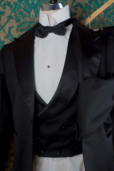 "The pricing on this listing is for a 3pc Handsewn Tux with the muslin fitting. We can make a similar tux in our Decadence '89 style with less handwork for a lower price. 1909 BESPOKE: These are our completely custom handmade suits. Each suit is crafted for an individual customer based on his tastes and lifestyle, and the price of the suit includes us spending 4 hours on designing your suit alone and sketching ideas. These suits are completely patterned, cut, and sewn here in our studio in Denve Luxury Fitted Three-piece Suit, Fitted Luxury Double Breasted Suit For Semi-formal Occasions, Luxury Fitted Double Breasted Suit For Semi-formal Occasions, Classic Three-piece Suit With Pressed Crease For Black-tie Events, Wedding Double Breasted Fitted Suit With Pressed Crease, Wedding Double Breasted Suit With Pressed Crease, Timeless Double Breasted Wedding Suit, Timeless Fitted Double Breasted Wedding Suit, Timeless Fitted Three-piece Suit