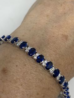 Vintage Cubic Zirconia Bracelet Clear blue Crystal Tennis 7.5 inches All jewelry is shipped free in the US in a nice gift box. Check out our over a THOUSAND great reviews Engraving is $4 per letter and is not always perfect depending on the piece. It can take a few days if the jeweler is busy. This is payable to Paypal Judithsltd@gmail.com Blue Diamond Bracelets As Gift, Blue Diamond Bracelet For Gift, Blue Cubic Zirconia Bracelet Gift, Elegant Blue Bracelets With Sparkling Stones, Blue Diamond Gemstone Bracelets, Classic Sapphire-colored Cubic Zirconia Bracelets, Blue Diamond Gemstone Bracelet, Blue Sapphire Bracelets For Anniversary, Sapphire Diamond Tennis Bracelet Gift