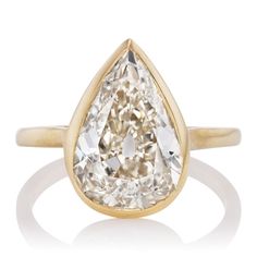 The Zinfandel 4.08 ring is a VB original design made right here in NYC. The ring centers a GIA-certified 4.08-carat pear cut diamond of K color, SI2 clarity. The stone is bezel-set in an 18kt yellow gold setting. Pear Cut Diamond Engagement Ring, Victor Barbone Jewelry, Victor Barbone, Teardrop Diamond, Pear Cut Engagement Rings, Flawless Diamond, Cut Engagement Rings, Light Well, Zinfandel