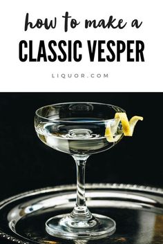 a martini glass with lemon wedges in it and the words how to make a classic vesper