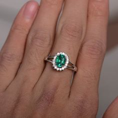 This is a gorgeous handmade creation. Its beauty is its simplicity & Elegance. The 6*8mm lab emerald is crafted in solid sterling silver and with rhodium plated. It's made to order and it will take about 7-10 days to make it. All item is sent in a beautiful gift box You can realize more lovely stuff clicking the link https://www.etsy.com/shop/knightjewelry?refshopsection_shophome_leftnav Please leave the correct address and you phone number for delivering successfully. Elegant Tsavorite Birthstone Ring, Classic 14k White Gold Emerald Ring For May Birthstone, Sterling Silver Brilliant Cut Rings For May Birthstone, Sterling Silver Rings With Brilliant Cut For May Birthstone, Oval Tsavorite White Gold Ring, Oval Tsavorite Ring In White Gold, Timeless Green Sterling Silver Ring, Silver Emerald Diamond Ring With Halo Design, Silver Diamond Ring With Emerald And Halo Design