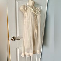 Wilfred Nwt Cotton/Silk Woven With Cotton Lace Trim Dress. Xs, Light Beige Color. Excellent Condition,Kept In Smoke Free Environment. Silk Mini Dress For Daywear, Sheer Silk Dress For Spring, Feminine Silk Daywear Dress, Feminine Silk Dress For Daywear, Chic Sleeveless Sleep Dress, Flowy Viscose Mini Dress For Daywear, Sheer Sleeveless Slip Dress For Beach, Sleeveless Lace Trim Mini Sleep Dress, Silk Mini Dress With V-neck For Daywear