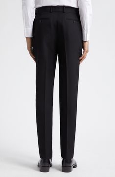 Tailored elegance pervades Italian-crafted pants fashioned from smooth wool with a mid rise and cleanly pressed creases. 34" inseam; 14 1/2" leg opening; 11 1/2" front rise; 14 1/2" back rise (size 48 EU) Zip fly with hook-and-bar closure Side-seam pockets; back button-welt pockets 100% wool Dry clean Made in Italy Designer Clothing Black Bottoms With Pressed Crease, Tailored Black Straight Pants, Tailored Black Pants With Straight Silhouette, Black Tailored Straight Silhouette Pants, Elegant Pants With Pressed Crease And Straight Silhouette, Office Bottoms With Concealed Placket And Straight Silhouette, Elegant Straight Silhouette Pants With Pressed Crease, Elegant Straight Pants With Pressed Crease, Sleek Straight Silhouette Bottoms For Evening