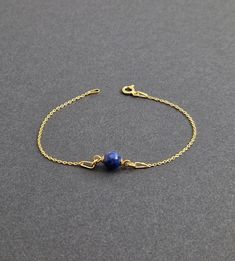 DESCRIPTION: Lapis Lazuli Bracelet with Sterling Silver; Lapis Lazuli Beads: Blue; Shape: Round; Weight: ~4 g; Type of Clasp: Spring Ring; Gems: Lapis Lazuli; Bead Size: ~6 mm; SHIPPING INFORMATION We send all orders within 1-3 business days after the payment is cleared. All packages are being sent via Regular Air Post (Registered). The most common Delivery time is as follows: Europe: 10-30 days; USA: 15-45 days; Elsewhere: 15-45 days; PACKAGING For convenient gifting, each anklet / bracelet fro Minimalist Blue Jewelry For Everyday, Minimalist Adjustable Lapis Lazuli Jewelry, Adjustable Minimalist Lapis Lazuli Jewelry, Elegant Lapis Lazuli Bracelets For Gifts, Adjustable Elegant Lapis Lazuli Bracelets, Everyday Blue Bracelet With Adjustable Chain, Elegant Blue Chain Bracelet For Everyday, Blue Adjustable Chain Bracelet For Everyday, Simple Blue Everyday Jewelry