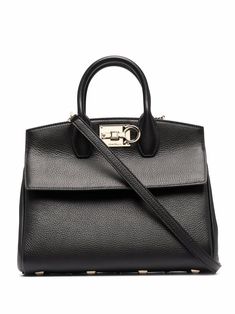 black leather adjustable detachable shoulder strap two rounded top handles silver-tone hardware main compartment internal zip pocket Gancini flip-lock fastening Ferragamo Bag, Salvatore Ferragamo Bags, Black Leather Tote Bag, Black Leather Handbags, Leather Tote Bag, The Studio, Womens Tote Bags, Salvatore Ferragamo, Leather Tote