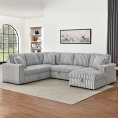 a living room with a large sectional couch