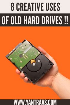 a hand holding an old hard drive with the words 8 creative uses of old hard drives