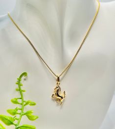 It's an 18K real Saudi gold horse necklace (popcorn chain)2.69 grams. Pendant is hollow.It's NOT  gold-filled or gold-plated. It's a lifetime guarantee. pendant stamp: 750 chain stamp: 750 Pictures are enlarged to show the details of the item. Please refer the dimensions for the actual size of the item. You can message me if you have any questions. Your 100% satisfaction is our top priority. Thank you for shopping with us! Use Code:SAVE10 if you order more than 1 item. Gold Horse Design Pendant Necklace, Gold Pendant Necklace With Horse Design, Horse Pendant, Saudi Gold, Gold Horse, Horse Necklace, Horses Pendant, Linking Rings, Top Priority