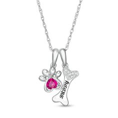 Pique her interest with this Personalized paw pendant. Fashioned in sterling silver, this splendid look features a 4.0mm heart-shaped simulated birthstone of your choice. Further customize this choice with a name or word - up to five characters in length - inscribed along a bone-shaped charm with a heart-shaped composite of diamond accents. Polished to a bright shine, this pendant suspends along an 18.0-inch rope chain that secures with a spring-ring clasp. Sterling Silver Birthstone Necklace For Valentine's Day, Pink Sterling Silver Birthstone Necklace, Elegant Sterling Silver Paw Print Necklace, Elegant Sterling Silver Necklace With Paw Print, Silver Sterling Birthstone Necklace With Heart Cut, Silver Sterling Silver Heart Cut Birthstone Necklace, Silver Jewelry With Paw Print For Mother's Day, Mother's Day Silver Jewelry With Paw Print, Valentine's Day Engraved Sterling Silver Birthstone Necklace