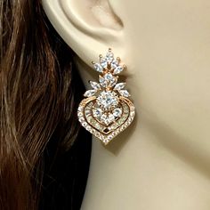 "A pair of glamour statement Art Deco Gatsby wedding style cz bridal earrings, made of high quality cubic zirconia in a choice of silver rhodium, yellow gold or rose gold plated base. Earrings are about 1 1/2\" (4 cm) including posts. View matching pieces or similar designs at https://etsy.me/2tIzwtX View designs with marquise shapes at https://etsy.me/2flzzGg View all earrings at https://etsy.me/1f8VFT4" Glamorous Diamond Wedding Earrings, Glamorous Diamond Earrings For Wedding, Cluster Earrings With Diamond Accents For Wedding, Glamorous Diamond Accented Jewelry For Wedding, Glamorous Wedding Jewelry With Diamond Accents, Glamorous Wedding Diamond Earrings With Diamond Accents, Glamorous Wedding Diamond Earrings With Accents, Rose Gold Diamond Crystal Earrings For Wedding, Glamorous Drop Diamond Earrings For Wedding