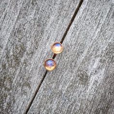 These beautiful Rose Gold Studs are ON SALE at Keepsake Design, LLC Available in Sterling Silver or Rose Gold Vermeil. #Moonstone #Studs #Earrings #jewelry #Handmade #Handcrafted #Etsy #EtsyShop #EtsySeller #EtsyGifts #handmadegifts #GiftForHer #RoseGold #sterlingsilver #925sterlingsilver #giftforgirl #Christmas #Presents #Sale Hypoallergenic Sterling Silver Iridescent Jewelry, Hypoallergenic Celestial Round Earrings, Hypoallergenic Iridescent Sterling Silver Jewelry, Gold Sterling Silver Cartilage Earrings Gift, Dainty Amber Round Jewelry, Dainty Round Amber Jewelry, Dainty Round Cartilage Earrings As Gift, Yellow Gold Round Cartilage Earrings For Gifts, Dainty Cartilage Earrings As A Gift