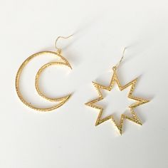 asymmetrical moon and star earrings gold plated over brass Adjustable Celestial Star Jewelry, Elegant Metal Earrings With Star Charm, Star Shaped Metal Jewelry With Star Charm, Metal Star Charm Jewelry, Celestial Style Yellow Gold Plated Hoop Earrings, Elegant Star-shaped Pierced Jewelry, Celestial Style Gold-plated Yellow Gold Hoop Earrings, Elegant 14k Gold Filled Star Jewelry, Elegant Star-shaped 14k Gold Filled Jewelry