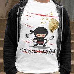 a person wearing a t - shirt with a cartoon character on it