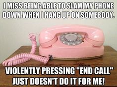 an old pink phone sitting on top of a wooden table with the caption, i miss being able to slam my phone down when i have up on someone