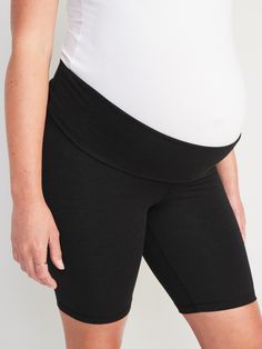 Elasticized rollover waistband, with light-reflecting Old Navy Active logo at center back.  Soft, breathable low compression jersey holds you in while letting you vent.  Go-Dry moisture-wicking technology keeps you dry & comfortable.  Four-way super stretch for ultimate movement.  Flat-lock seams prevent chafing.  Versatile panel rolls up or down for added support.  Fitted through hip and thigh.  Maternity biker shorts hit mid-thigh.  8" inseam (sizes XXS-M), 8 1/4" inseam (size L), 8 1/2" insea Short Length Comfort Stretch Activewear For Workout, Breathable Black Biker Shorts For Yoga, Athletic Shorts With Wide Waistband, Mid-thigh Length For Sports, Short Length Activewear With Waistband For Gym, Mid-thigh Athletic Shorts With Wide Waistband, Athletic Shorts With Wide Waistband For Sports, Mid-thigh Length, Stretch Black Biker Shorts With Wide Waistband, 4-way Stretch Black Biker Shorts, Black Stretch Biker Shorts With Wide Waistband