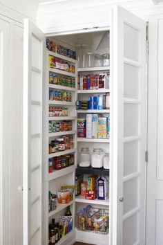 an open pantry with lots of food in it