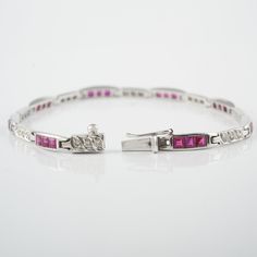 This bracelet is set in 14K Solid White Gold, Studded with Princess-cut Rubies and Round Diamonds; Three rubies alternating with three diamonds. A luxury jewelry gift for your loved ones. -Material - 14K Solid white Gold -Gemstone - Ruby & Diamonds -Gemstone Weight - 3.010 ct -Diamond Weight - 0.450 ct -Gross weight - 10.9 grams The bracelet length can be adjusted to your wrist size, on request. You can also go to my shop Home for more similar bracelets: https://www.etsy.com/in-en/shop/Silve Ruby Diamond Bracelet, Luxury Jewelry Gift, Bracelet Elegant, Bracelet Tennis, Ruby Bracelet, Birthstone Bracelet, 925 Silver Bracelet, Bracelet Chain, Birthstone Bracelets