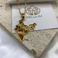 Elevate Your Style with ReluumJewellery's Country Map Pendant Necklaces: Introducing our India Map Outline Pendant Necklace, a symbol of admiration for the rich heritage and diverse landscapes of this vibrant nation. Crafted with meticulous detail, this pendant elegantly showcases the distinctive outline of India's map, capturing its cultural richness and historical significance. Whether you're a proud Indian or simply captivated by its allure, wear this piece with pride and grace.  🌍 Embrace t Traditional Gold Jewelry For Commemoration, Traditional Gold Necklaces For Mother's Day, Traditional Gold Necklace For Mother's Day, Gold Jewelry For Celebration Or Gift, Gold Jewelry For Mother's Day Celebration, Gold Hallmarked Necklace For Birthday Gift, Gold Necklaces With Hallmarks As Gifts, Customized Yellow Gold Jewelry Gift, Customized Yellow Gold Jewelry As A Gift