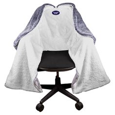 an office chair with a white blanket on it's back and black seat cushion