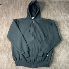 Vintage 2000s Russell Athletic Basic Blank Sportswear Athletic Y2K Aesthetic Streetwear Green Zip Up Hoodie Extra Large Mens Condition:  Excellent Used Condition  = No Flaws Measurements: Please see photos above for all measurements IF YOU BUY TWO OR MORE ITEMS USE THE CODE BUNDLE @ CHECK TO SAVE 20% WE SHIP WITHIN 24 HOURS AFTER PURCHASE! Please be aware that we do not offer free returns!! The Buyer is responsible for the cost of the return label. Follow us on TikTok & Instagram @findsnostalgic and tag us in your finds Sportswear Hooded Jacket With Ribbed Cuffs For Streetwear, Fleece Hooded Jacket For Streetwear, Winter Fleece Sweats For Sports Events, Heavyweight Long Sleeve Sports Hoodie, Heavyweight Long Sleeve Hoodie For Sports, Heavyweight Sweatshirt For Winter Sports, Heavyweight Winter Sports Sweatshirt, Urban Hooded Sweatshirt For Sports, Cotton Hooded Jacket For Streetwear