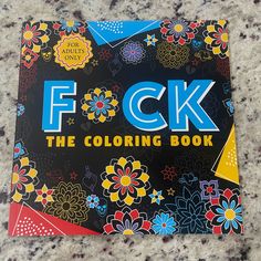 the coloring book for f k is on the floor