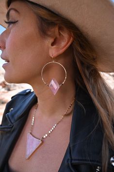 These stunning Rose Quartz gold hoop earrings are the perfect accessory for any outfit, and remind you to love yourself first every single day! They're versatile, and can be dressed up or down depending on the occasion. They are perfect for wearing to work, on a date, or to a special event. The soft pink hue of the rose quartz adds femininity and elegance, while the gold adds a touch of sophistication. Rose quartz is known for its calming and soothing energy, making these earrings not only beaut