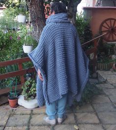 Gray Chunky Knit Poncho, Oversized Knit Sweater, Poncho Sweater Long Giant handmade knitted cardigan-poncho. This chunky knit poncho- cardigan is oversized, very soft, super warm . As it is oversized you can wrap yourself in it like in a blanket and feel cozy, stay warm and look awesome and stylish. Match it with different clothes, shoes as well as textures and enjoy every outfit! Fully handmade. The poncho can be worn on both sides so you have two different knits. On cold winter days, you can u Cozy Oversized Acrylic Knitting Pattern, Oversized Cozy Acrylic Knitting Pattern, Oversized Knitted Winter Cape, Oversized Hand Knitted Acrylic Knitting Pattern, Oversized Knit Poncho With Batwing Sleeves, Knit Poncho With Batwing Sleeves, Handmade Oversized Winter Poncho, Winter Handmade Oversized Poncho, Winter Knitted Poncho Cape