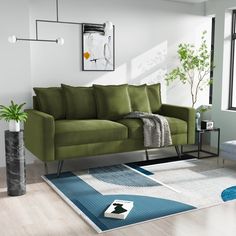 a living room with a green couch and rug