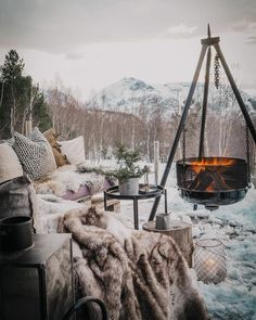 an outdoor fire pit in the middle of winter