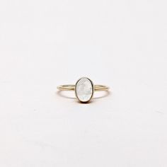 Natural Rainbow Moonstone Oval Cabochon Gemstone Stackable Ring. Semi Precious Gemstone Ring in 14k SOLID GOLD For Her from our Capsule Jewelry Collection.RainBow Moonstone is set in Bezel Setting in our Factory. Gold Ring AAA+ Quality. Perfect Gift For Everyday or June Birthstone Gift for Your Loved Ones. ►  DIMENSIONS : ◆ Gemstone : Rainbow Moonstone 0.60ct ◆ Stone size : 6*8 mm ◆ Shank Width : 1 mm      ◆  Material :  14k Yellow Gold      EACH Ring is Stamped With 585 Marked As 14k GOLD International Standard. All my gemstones are hand-selected for best quality assurance, then precisely sawed, and shaped into the desired geometry. The precious stones are then delicately grinned, sanded, and hand-polished to make sure each Ring has the perfect aesthetic. * Contact us For Resizing and Per Heirloom Moonstone Ring With Rose Cut Diamonds For Promise, Heirloom Moonstone Ring With Rose Cut Diamonds, Heirloom Style Moonstone Ring With Rose Cut Diamonds, 14k Gold Moonstone Promise Ring With Rose Cut Diamonds, Recycled Gold Gemstone Ring, Stackable Oval 14k Gold Jewelry, Heirloom Stackable White Jewelry, Gold Moonstone Stackable Jewelry, Minimalist Jewelry With Bezel Setting For Promise