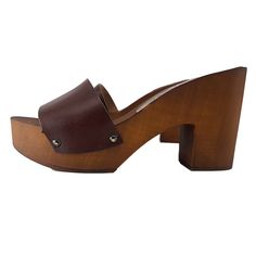 HANDMADE CLOGS wood-effect clogs made in italy -brown leather upper -heel 9 cm + plateau 3 cm -craftsman-made DON'T FORGET TO CHECK THE SIZE BEFORE YOU COMPLETE THE ORDER Size and LENGTH OF THE SHOE ALONG THE CURVE: 36 EU = 5 US = UK 4 = 23.50 CM 37 EU = 6 US = UK 5 = 24.00 CM 38 EU = 7 US = UK5.5 = 24.50 CM 39 EU = 8 US = UK 6 = 25.00 CM 40 EU = 9 US = UK6.5 = 25.50 CM 41 EU = 10US = UK7.5 = 26.00 CM Brown Open Toe Clogs With 4-inch Heel, Brown High Heel Platform Clogs, Brown Wooden Platform Clogs, Brown High Heel Clogs With Deep Heel Cup, Brown Leather Clogs With 4-inch Heel, Brown Closed Toe Clogs With Deep Heel Cup, Brown High Heel Mules With Padded Heel, Brown High Heel Mules With Deep Heel Cup, Brown Wooden Platform Heels