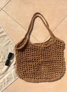 Handmade crochet rope beach bag Summer Beige Crochet Bag Made Of Yarn, Eco-friendly Macrame Straw Bag For Vacation, Bohemian Lightweight Crochet Beach Bag, Eco-friendly Lightweight Crochet Beach Bag, Brown Crochet Bag With Braided Handles For Vacation, Summer Crochet Bag In Sand For Beach Season, Summer Sand Crochet Bag For Beach Season, Summer Crochet Bag In Sand Color For Beach Season, Woven Crochet Bag For Beach Season