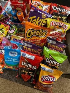 a pile of snacks sitting on top of a table