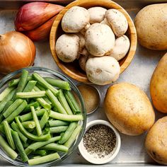 potatoes, green beans and other vegetables on a tray