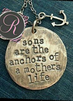 a necklace with the words sons are the anchors of a mother's life on it