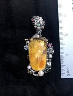 "ARTISAN AMBER GEMSTONE PENDANT Hand-made Sterling Silver 925. 24k Gold Stones used: Butterscotch Baltic Amber Pink&Green Tourmaline, Pearls Height - 2 3/4' (with bail), Width - 1 3/8' Height -70mm (with bail), Width - 35mm Unique Handcrafted One-of a-kind Design Pendant Each Piece of Jewelry in my Collection is Absolutely One of a Kind! When you start wearing a piece of my jewelry you will fall in love with it more and more each day and feel that good Energy and Love that I pass into it whi Luxury Citrine Gemstones For Gifts, Luxury Citrine Cabochon Jewelry, Luxury Hallmarked Citrine Jewelry, Luxury Citrine Jewelry For Gifts, Antique Handmade Flower Pendant Jewelry, Luxury Yellow Multi-stone Jewelry, Luxury Handmade Gemstones For Formal Occasions, Luxury Cabochon Jewelry As Gift, Luxury Cabochon Jewelry For Gift