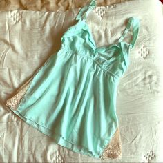 Sold Underella By Ella Moss Seafoam Satin Empire Camisole With Lace Insets. Really Pretty, Floaty Look For Lounge Or Regular Wear. No Tags But Never Worn Because It Doesn’t Fit My Bust (I’m 30d) Chic Sleepwear With Built-in Bra For Loungewear, Sleeveless Summer Slip With Built-in Bra, Summer Sleepwear Camisole With Built-in Bra, Stretch Sleepwear With Built-in Bra For Summer, Feminine Seamless Camisole For Loungewear, Camisole With Built-in Bra For Loungewear, Fitted Camisole With Built-in Bra For Relaxation, Feminine Spaghetti Strap Tank Top For Loungewear, Sleeveless Stretch Coquette Tops