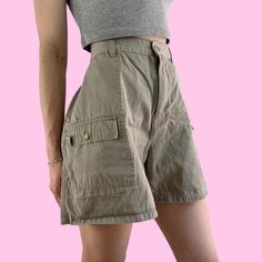 Vintage Tan Khaki Cargo Outdoor Shorts Button/zipper closure with pockets and a high waist. Great condition Brand - White Stag Tag size - 16 Seen on size small, 5'4 with waist pinned Measurements (laying flat) Waist (no pull) 15.75 in - (taut) 17 in Hips (3 inches above crotch seam) - 24.5 in Rise - 12.5 in Inseam - 5 in  Leg opening - 14 in Recommend for a 32/33" waist depending on desired fit #outdoorshorts #hikingshorts #granolagirl #cargoshorts #greencargoshorts Vintage Cargo Shorts, High Rise Utility Bottoms With Built-in Shorts, High Rise Workwear Shorts With Belt Loops, Utility High-waisted Shorts With Cargo Pockets, Beige Utility Cargo Pants Short Length, High-waisted Utility Cargo Shorts, High-waisted Khaki Shorts For Work, High Rise Utility Shorts With Cargo Pockets, Utility High Rise Shorts With Cargo Pockets