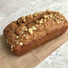 a loaf of bread sitting on top of a piece of paper