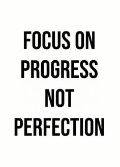 a black and white sign that says focus on progress not perfection