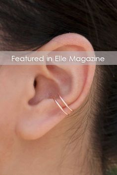 an ear is shown with the word'featured in ellie magazine'written below it