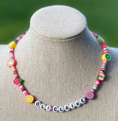 Beaded Name Necklace This colorful necklace features a name or word of your choice. The perfect for girls and boys of all ages!  Special Requests are always welcomed <3 Cute Personalized Multicolor Charm Necklaces, Fun Pink Adjustable Charm Necklace, Fun Pink Adjustable Charm Necklaces, Adjustable Multicolor Charm Necklace For Friendship, Pink Adjustable Fun Charm Necklace, Playful Multicolor Personalized Charm Necklaces, Playful Personalized Multicolor Charm Necklaces, Personalized Multicolor Playful Charm Necklaces, Fun Adjustable Letter Beads Necklace